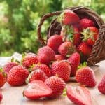 fresh strawberries from a wooden basket