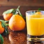 orange juice in a little glass